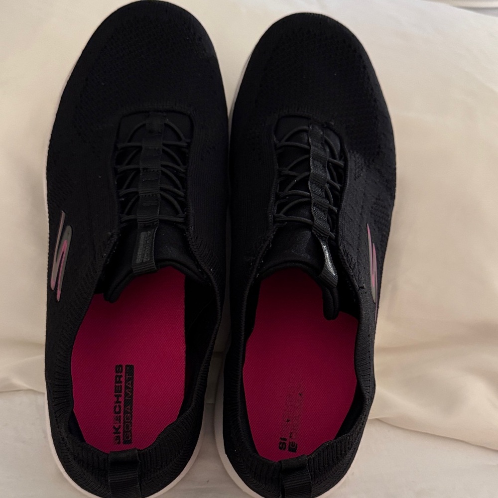 Skechers Women’s Black Slip-On Sneakers with Pink Insoles